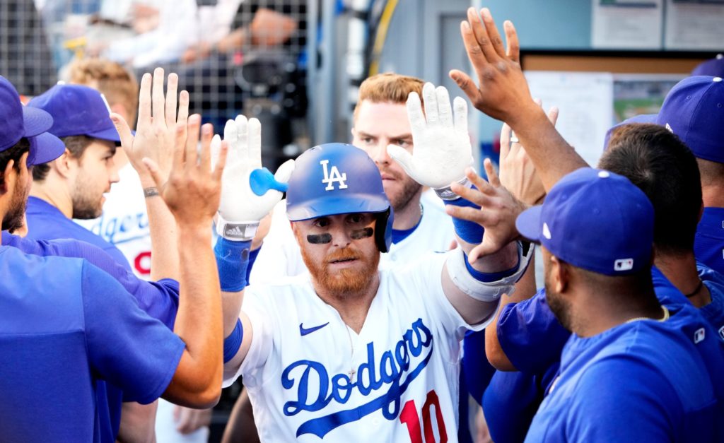 Justin Turner celebrates in the dugout